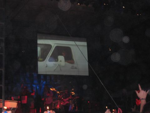 1988 Ford Bronco - A white van's interior is displayed on a screen during a concert.