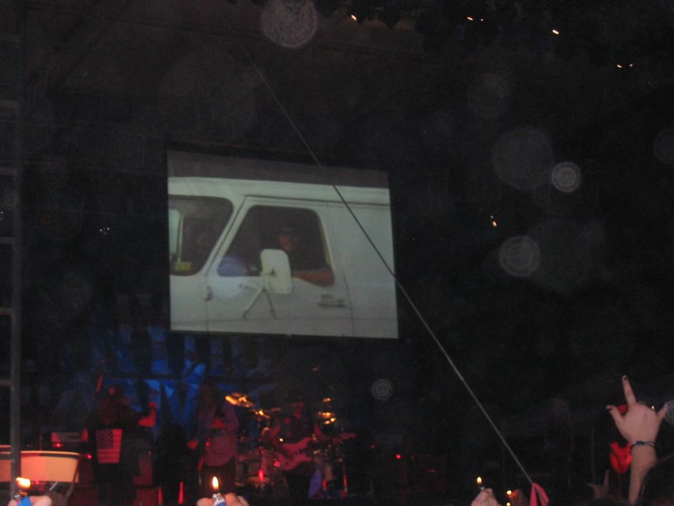 Interior view of a white van with a driver and side mirror