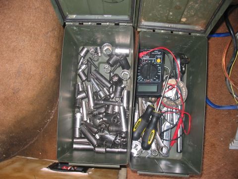 1988 Ford Bronco - Ammo cans serve as toolboxes, holding sockets, wrenches, and a multimeter.