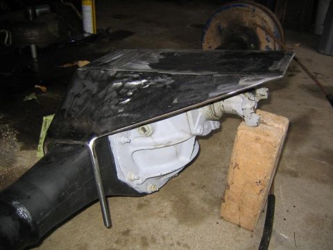 1978 Ford Bronco - A close-up view of a vehicle's differential housing, fitted with a protective skid plate.