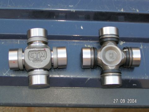 1978 Ford Bronco - Two universal joints are displayed, one marked CTM USA and the other P3 BC, against a dark blue background.