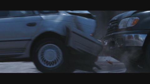 1998 Ford Taurus - A collision between two vehicles, one sedan and one SUV, is captured in this image.