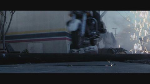 1998 Ford Taurus - A vehicle is overturned on its side, with sparks showering from the scene.