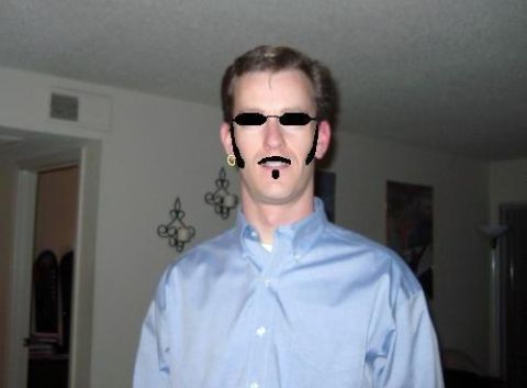 1985 Ford Bronco - A man poses for a photo with digitally added facial hair and sunglasses.