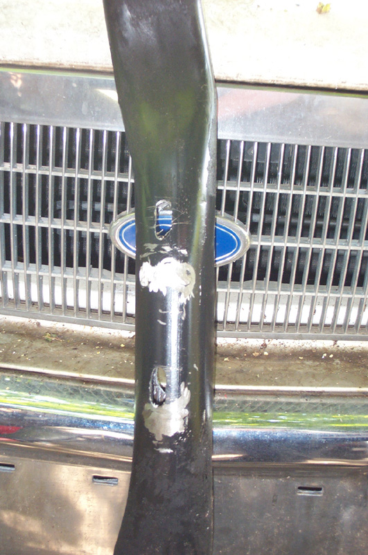 Original mounting pad was ground off and new holes drilled.