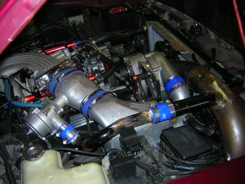 1992 Ford Crown Victoria - Custom turbocharger setup with polished intake piping and blue couplers is visible in the engine bay.