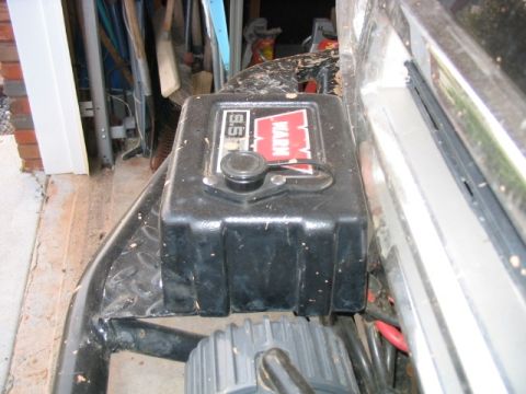 1986 Ford F-150 - Close-up of a Warn 9.5 winch cover, part of a vehicle's off-road equipment.