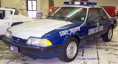 2001 Ford Crown Victoria - This Ford Mustang GT is marked as a Georgia State Patrol vehicle, differing from the registry's claim of a 2001 Ford Crown Victoria.