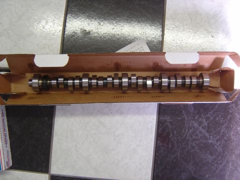 1993 Ford Bronco - A new camshaft is shown inside its packaging, ready for installation.