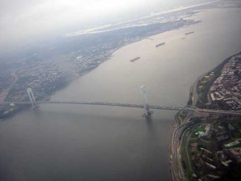 1995 Ford Bronco - An aerial perspective captures the Verrazzano-Narrows Bridge, a major suspension bridge connecting two boroughs of New York City.