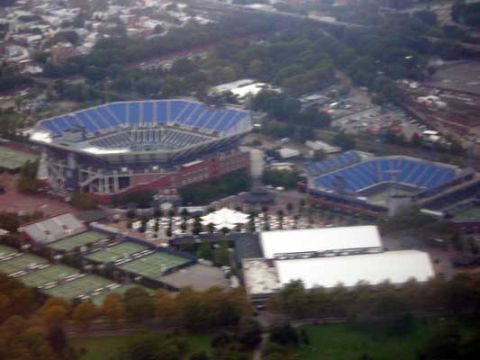 1995 Ford Bronco - An aerial perspective captures a large stadium complex, complete with multiple seating areas and adjacent sports facilities.