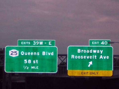 1995 Ford Bronco - Highway exit signs indicate routes for Queens Blvd, 58th St, Broadway, and Roosevelt Ave.