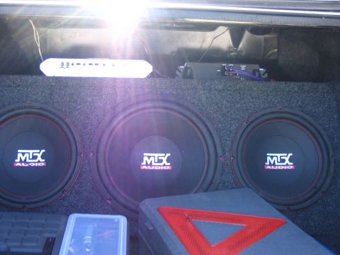 1996 Ford Taurus - 2 10 inch MTX roadthunders and a 12 inch MTX roadthunder. with a 251D MTX amp, and a 4002T audiobahn