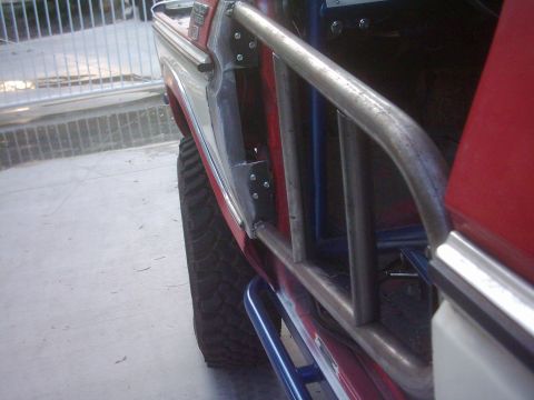 1978 Ford Bronco - This 1978 Ford Bronco features a custom tube door and roll cage setup, visible from the side.