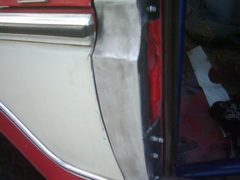 1978 Ford Bronco - Detail shot of a vehicle's door jamb, highlighting the metal structure and trim pieces.