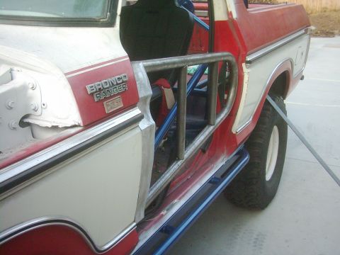 1978 Ford Bronco - This 1978 Ford Bronco Ranger XLT features custom tube doors and a roll cage, indicating off-road modifications.