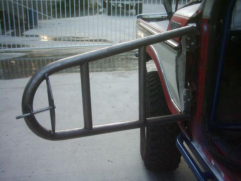 1978 Ford Bronco - Custom tube doors are attached to the side of a 1978 Ford Bronco.
