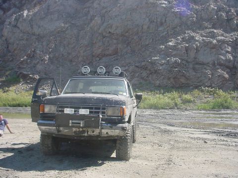 1988 Ford Bronco - This Ford Bronco II is equipped with off-road lights and a brush guard, ready for adventure.
