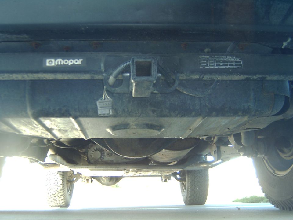 Mopar Class I receiver hitch with trailer wiring under a vehicle's rear bumper
