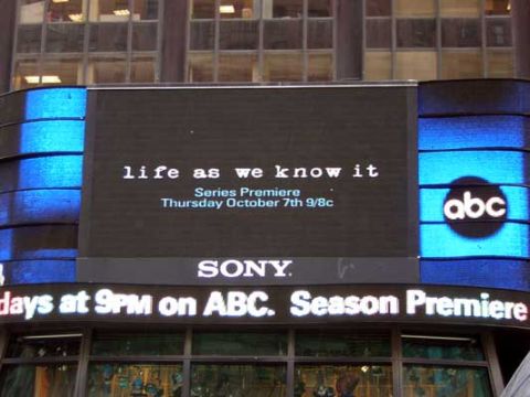 1995 Ford Bronco - A digital billboard in Times Square advertises the series premiere of 'life as we know it' on ABC.