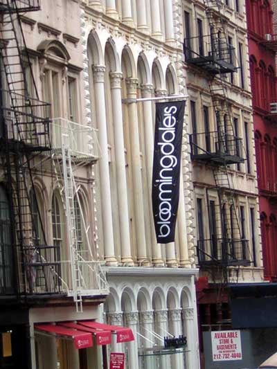1995 Ford Bronco - A street view of a building with a large Bloomingdale's banner hanging vertically.