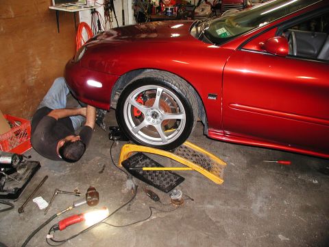 1992 Ford Taurus - Bob workin' on Dylan's cah.