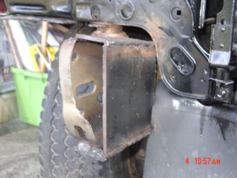 1991 Ford F-150 - Custom frame modification showing a welded bracket and suspension components.
