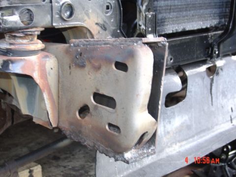 1991 Ford F-150 - This image shows a close-up view of a modified truck frame, likely during a repair or upgrade process.