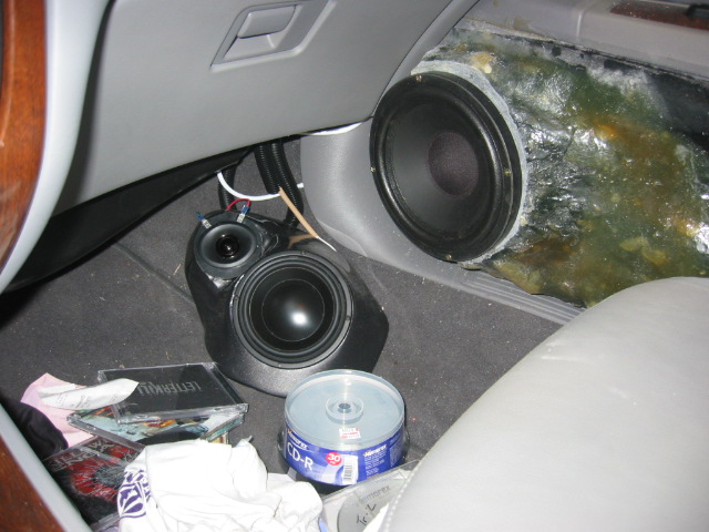 installed door, speaker, and kick pannels.  the kick pannels are painted the same as the exterior.  the glove box wont open with the door shut, and there are some issues with closing the door.  but i have 8 inch speakers dammit!!