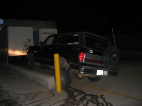 1988 Ford Bronco - This 1988 Ford Bronco is seen from the rear, its external spare tire and distinctive taillights.