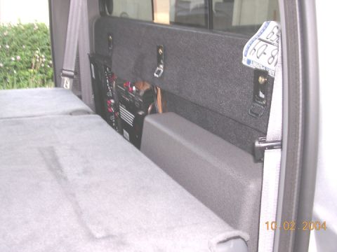 2004 Ford F-250 - sub fits in tray, next to both fosgate amps