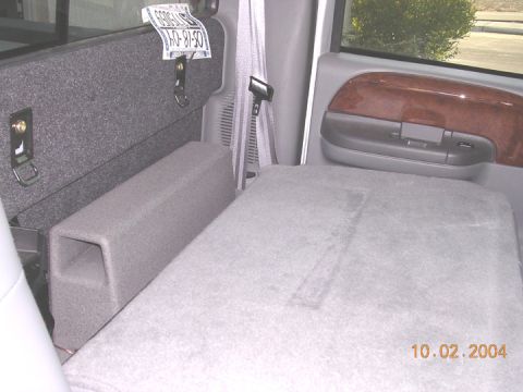 2004 Ford F-250 - sub installed with seat in, you can see where the sub rubs a little. I left the rear skin intact, but did cut the lower piece of the "rib"…