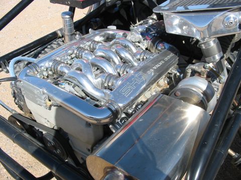 1993 Ford Taurus - Custom SHO engine with polished intake and exhaust components.