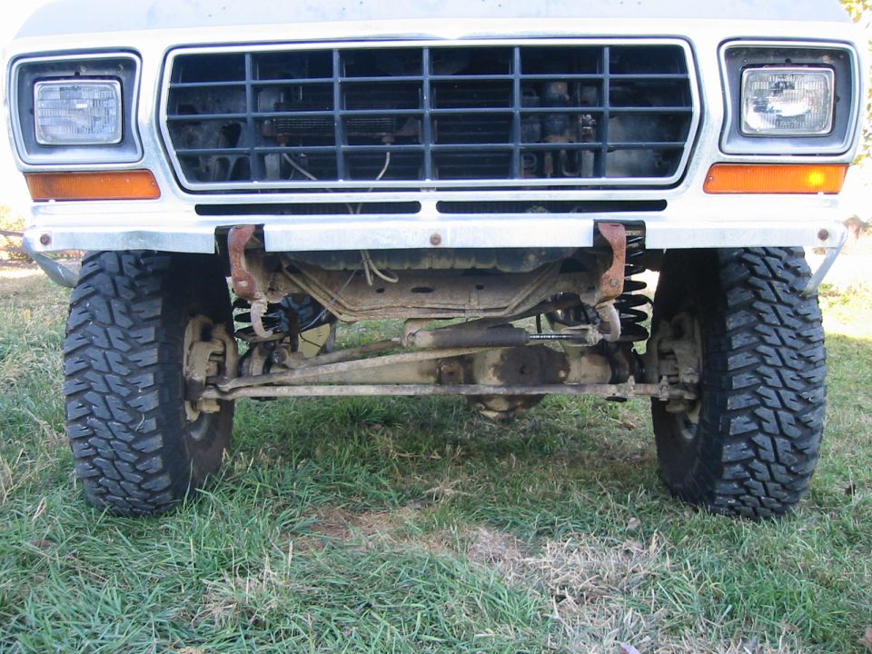 Front view of a 1978 Ford Bronco with a large grille and off-road tires