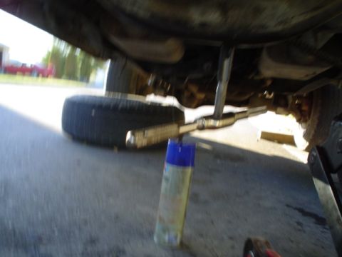 1981 Ford Bronco - tapping the hole after slowly drilling the 29/64 hole