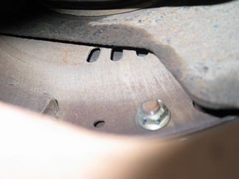 1995 Ford Bronco - Remove the torque converter bolts. I think there are five nuts holding the converter to the flexplate. Remove a nut and then use a big flat…