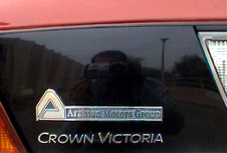 2000 Ford Crown Victoria - Close-up of the rear of a vehicle showing manufacturer and dealer badging.