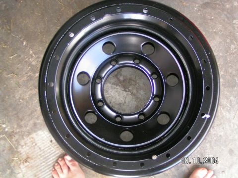 1978 Ford Bronco - A black steel wheel is shown, with a date stamp of 08.10.2004 visible in the lower right corner.
