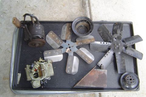1993 Ford Bronco - Various engine components are laid out on a tray, suggesting a repair or restoration project.