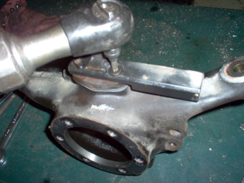 1983 Ford Bronco - Tighten the screws fully. Note that the tab on the weight is AWAY from the spindle surface.