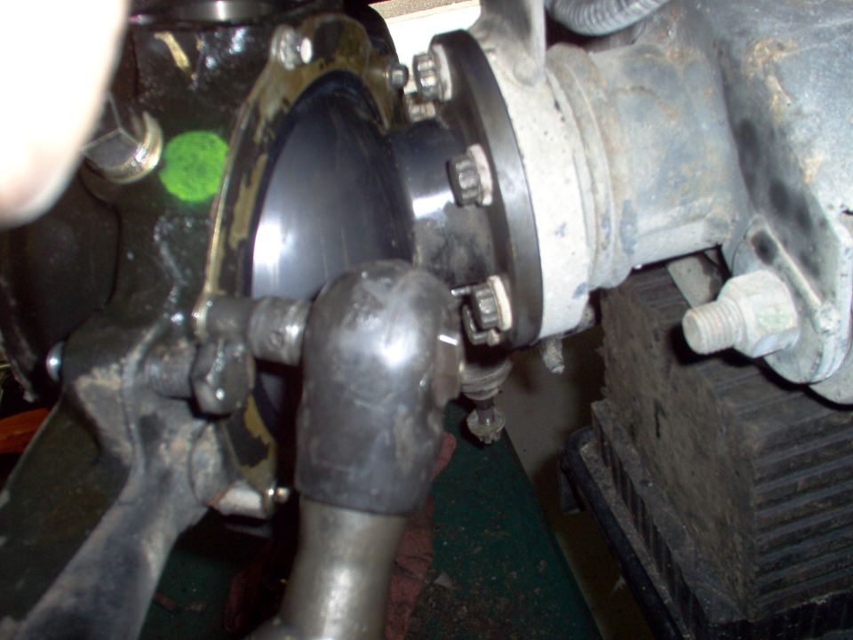 Tighten the 8mm screws.  The retainer only fits one way.