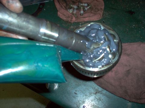 1983 Ford Bronco - Prelube the CV, then work it around so the grease goes inside, then install the shaft assembly thru the knuckle.