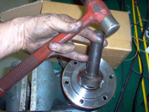 1983 Ford Bronco - Use a drift to set the bearing back in. If it's not damaged, it can be reused.