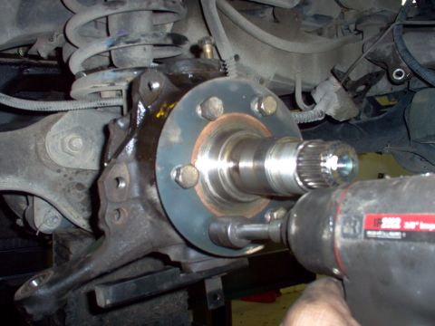 1983 Ford Bronco - Using a new gasket, reinstall the spindle & the ring. I prefer the flat facing up, but the rear hubs have it facing front. I don't think it…