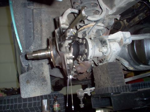 1983 Ford Bronco - Reinstall the brake shield, using a 19mm for the stop bolt's nut, & an 8mm and 10mm for the bottom.