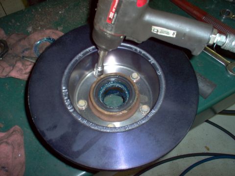 1983 Ford Bronco - Install the rotor, using anti-sieze lubricant where it presses onto the hub, and on the bolts. The heads are 12-point 14mm.