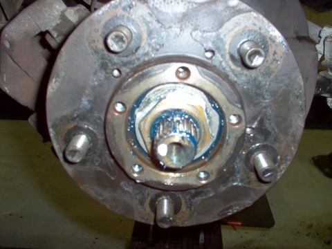 1983 Ford Bronco - Look past the folded area to see where the inner nut's flats are, and fold the ring inward over one of them. Reinstall the caliper, brakes,…