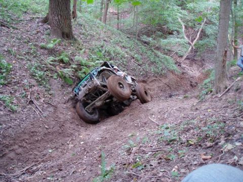 1992 Ford Bronco - This vehicle appears to be stuck in a steep, muddy ravine.