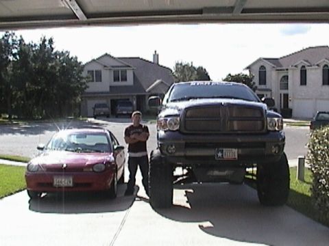 1989 Ford Bronco - Dodge next to Neon and other friend