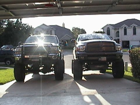 1989 Ford Bronco - Dodge next to friends ford f250 with 10" lift and 40's
